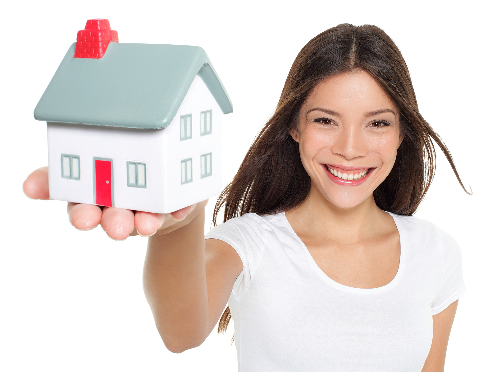 woman holding mini house. House mortgage and happy home owner conceptual image with multi-ethnic Asian Chinese / Caucasian female model on white background.